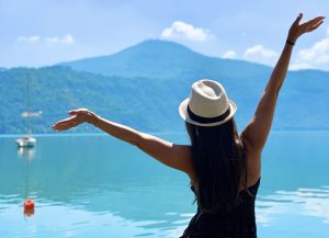 manifest a woman looking at the lake